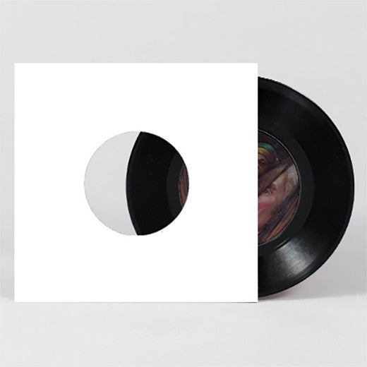 7" Vinyl Records in Black or White Jackets